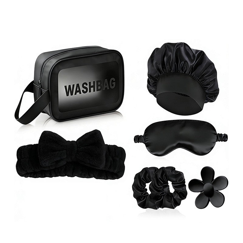 Giftplug 6-piece black beauty travel set including a washbag, silk bonnet, sleep mask, headband, scrunchies, and clip.