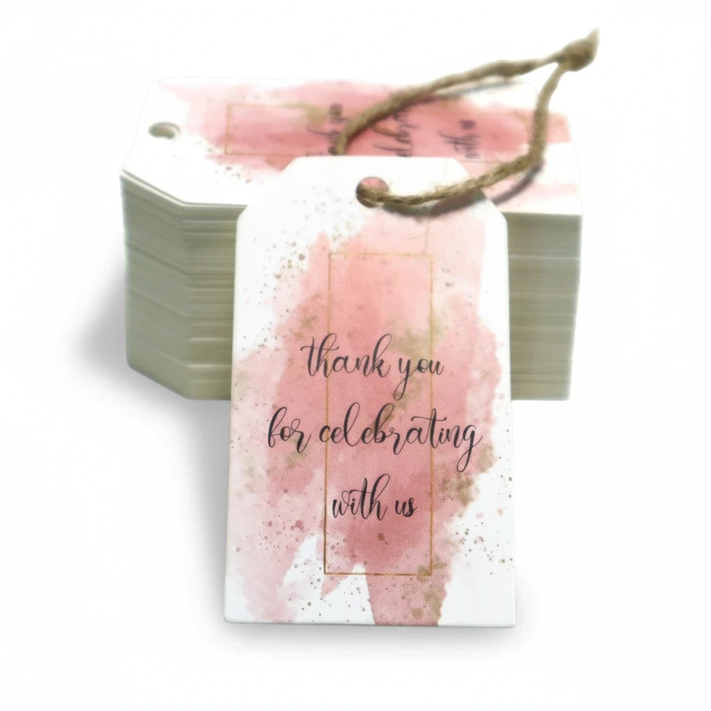 Giftplug blush pink watercolor favor tags with gold foil accents and jute twine for weddings and special events.