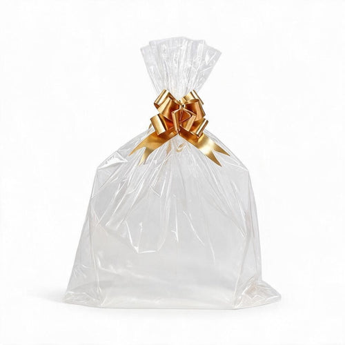 Giftplug clear cellophane gift bag with a shimmering gold decorative bow for elegant party favors and presents