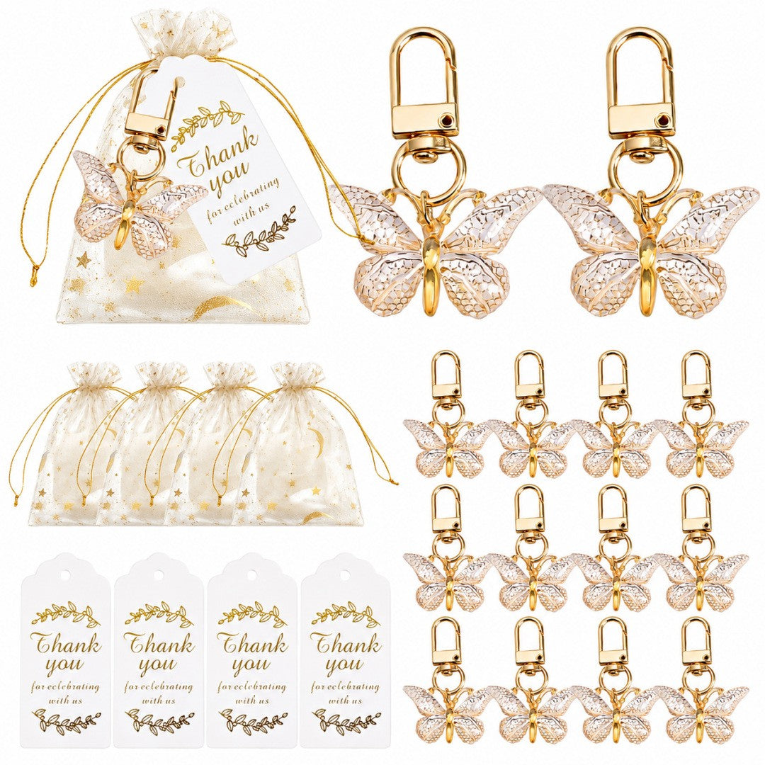 Giftplug butterfly keychain party favors with gold-tone metal charms, organza gift bags, and thank you tags.