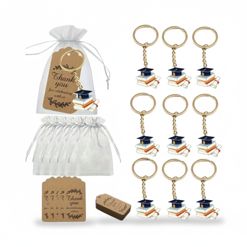 Giftplug graduation keychain set featuring enamel mortarboard caps and books with organza bags and thank you tags.