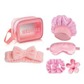 Giftplug 6-piece pink beauty travel set with plush bow headband, satin sleep mask, bonnet, scrunchies, and washbag.