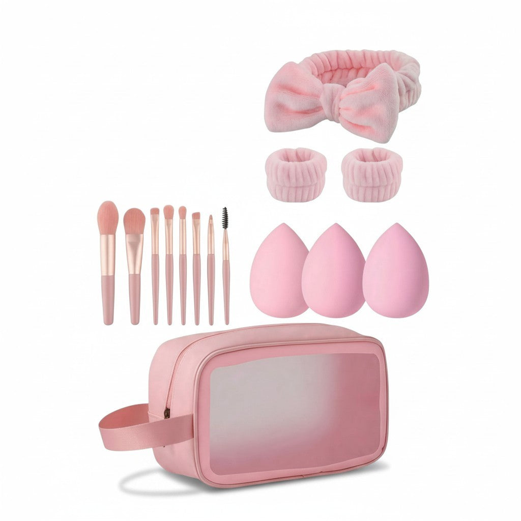Giftplug pink makeup brush set with sponges, bow headband, wrist cuffs, and a clear travel bag for beauty routines.