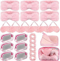 Giftplug 24-piece pink plush skincare set with bow headbands, eye masks, wristbands, and clear cosmetic bags.