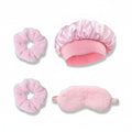 Giftplug four-piece pink satin sleep bonnet, faux-fur eye mask, and two plush scrunchies for hair protection.