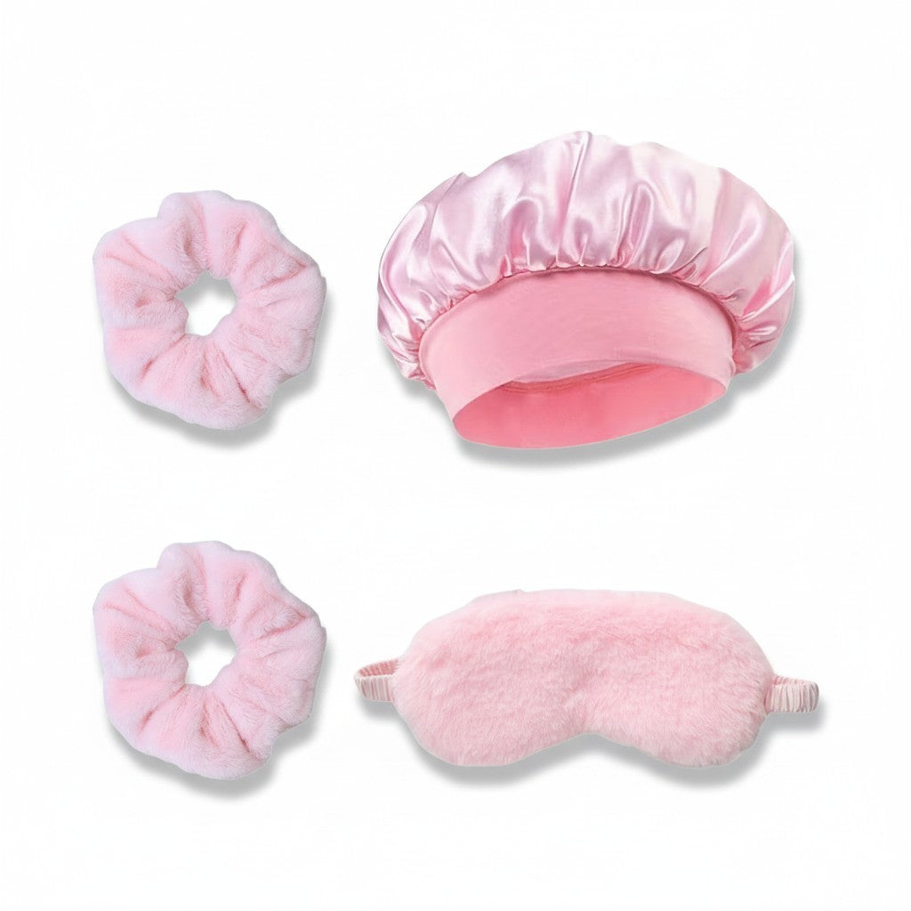 Giftplug four-piece pink satin sleep bonnet, faux-fur eye mask, and two plush scrunchies for hair protection.
